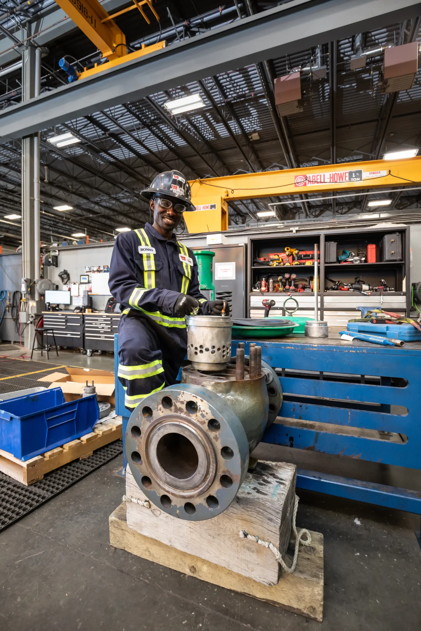 Tundra technician servicing a valve in the valve shop