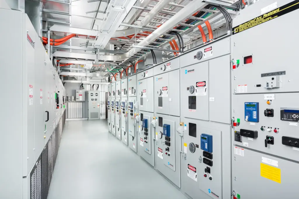 Metal-clad switchgear lineup inside a Tundra electrical building